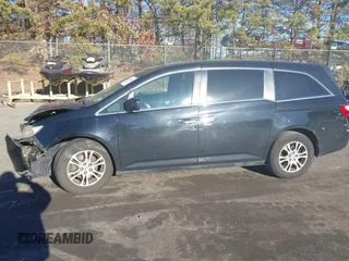 2011 Honda Odyssey EX-L with VIN 5FNRL5H61BB059275, listed as a IAAI auction lot 41293690 with 105,511 mi miles and . Bid and sale history available at carsss.com. Image 14.