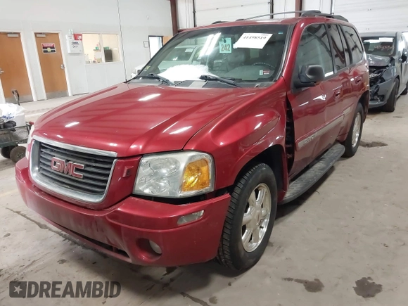 2003 GMC Envoy SLT with VIN 1GKDT13SX32134944, listed as a IAAI auction lot 41498519 with 149,640 mi miles. Bid and sale history available at carsss.com. Image 6.