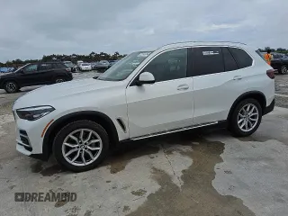 2023 BMW X5 xDrive40i z VIN 5UXCR6C08P9P32642, wystawiony jako Copart lot #56059525 z przebiegiem 48 802 mil mil oraz Czysty tytuł • Clean title. Historia ofert i sprzedaży dostępna na DreamBid. Obrazek 1.