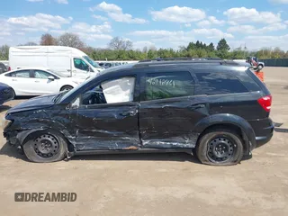 2011 Dodge Journey Mainstreet with VIN 3D4PH1FG2BT516953, listed as a IAAI auction lot 42112461 with 203,909 mi miles and . Bid and sale history available at DreamBid. Image 13.