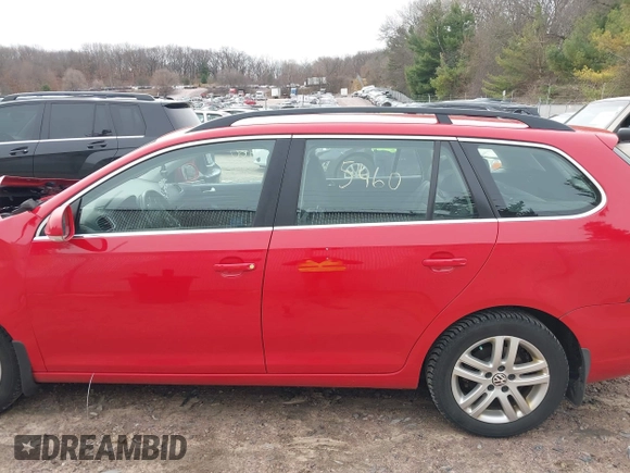 2012 Volkswagen Jetta SportWagen TDI with VIN 3VWPL7AJ7CM687465, listed as a IAAI auction lot 41945460 with 136,912 mi miles. Bid and sale history available at carsss.com. Image 14.