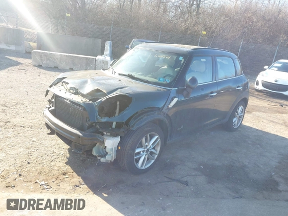 2012 MINI Countryman S with VIN WMWZC5C52CWL62574, listed as a IAAI auction lot 41768196 with 159,816 mi miles and . Bid and sale history available at DreamBid. Image 2.