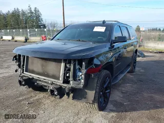 2018 Chevrolet Suburban LT with VIN 1GNSKHKC4JR130845, listed as a IAAI auction lot 41623614 with 148723 miles. Bid and sale history available at carsss.com. Image 18.
