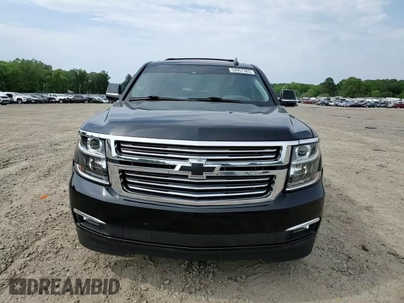 2015 Chevrolet Suburban LTZ with VIN 1GNSKKKC1FR624679, listed as a Copart auction lot 52957365 with 71,194 mi miles and Salvage Title. Bid and sale history available at DreamBid. Image 14.