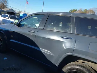 2018 Jeep Grand Cherokee Laredo E with VIN 1C4RJFAGXJC147400, listed as a IAAI auction lot 41358662 with 97,184 mi miles. Bid and sale history available at carsss.com. Image 15.