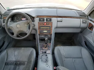 2000 Mercedes-Benz E-Class with VIN WDBJF70JXYB113988, listed as a Copart auction lot 86325514 with 198,321 mi miles and Salvage Title. Bid and sale history available at carsss.com. Image 8.