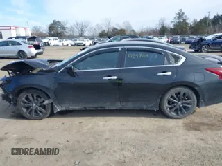 2018 Nissan Altima 2.5 SR with VIN 1N4AL3AP5JC283588, listed as a IAAI auction lot 41397101 with 151,478 mi miles. Bid and sale history available at carsss.com. Image 13.