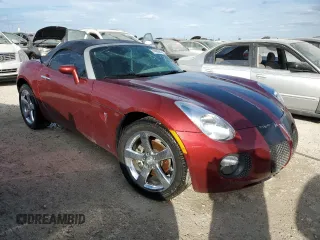 2009 Pontiac Solstice GXP z VIN 1G2MT35X59Y105202, wystawiony jako Copart lot #74429594 z przebiegiem Nie podano mil oraz Szkoda całkowita • Salvage title. Historia ofert i sprzedaży dostępna na DreamBid. Obrazek 4.