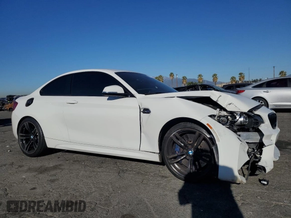 2017 BMW M2 with VIN WBS1H9C31HV887767, listed as a Copart auction lot 81957614 with 53,284 mi miles and Salvage Title. Bid and sale history available at carsss.com. Image 4.