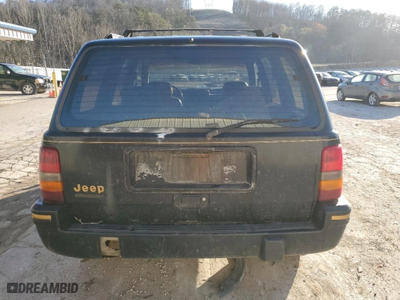 1994 Jeep Grand Cherokee Limited with VIN 1J4GZ78S0RC357283, listed as a Copart auction lot 49236995 with 84,306 mi miles and Salvage Title. Bid and sale history available at carsss.com. Image 6.
