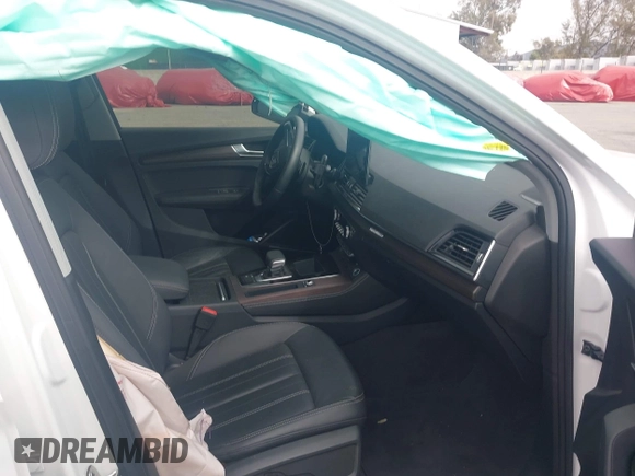 2021 Audi Q5 Premium Plus z VIN WA1E2AFY1M2088449, wystawiony jako IAAI lot #39055032 z przebiegiem 83 555 mil mil oraz . Historia ofert i sprzedaży dostępna na DreamBid. Obrazek 5.