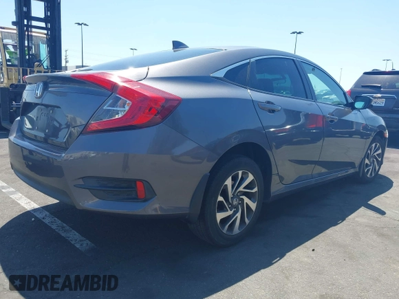2018 Honda Civic EX с VIN 2HGFC2F76JH600117, выставлен на аукционе IAAI как лот 42131831 с пробегом 156 491 миль миль и . История ставок и продаж доступна на DreamBid. Изображение 4.