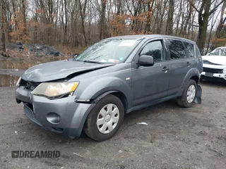 2007 Mitsubishi Outlander ES z VIN JA4MS31X07Z015784, wystawiony jako IAAI lot #38911508 z przebiegiem 166 115 mil mil oraz . Historia ofert i sprzedaży dostępna na DreamBid. Obrazek 2.