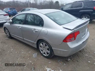 2006 Honda Civic LX with VIN 1HGFA16516L115313, listed as a IAAI auction lot 42018073 with 193,621 mi miles and . Bid and sale history available at DreamBid. Image 3.