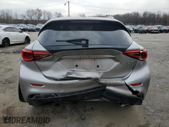 2018 Infiniti QX30 Premium z VIN SJKCH5CP7JA003241, wystawiony jako Copart lot #82825934 z przebiegiem 64 411 mil mil oraz Szkoda całkowita • Salvage title. Historia ofert i sprzedaży dostępna na DreamBid. Obrazek 6.