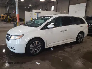 2016 Honda Odyssey Touring Elite z VIN 5FNRL5H94GB053231, wystawiony jako Copart lot #61419355 z przebiegiem 132 543 mil mil oraz Szkoda całkowita • Salvage title. Historia ofert i sprzedaży dostępna na DreamBid. Obrazek 1.