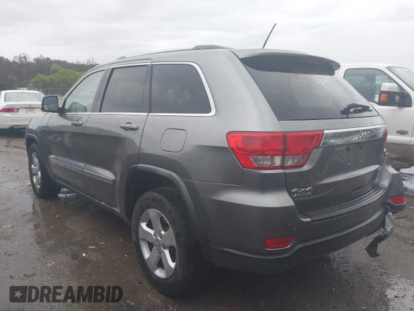 2012 Jeep Grand Cherokee Laredo with VIN 1C4RJFAG0CC156545, listed as a IAAI auction lot 41909296 with 170,033 mi miles. Bid and sale history available at carsss.com. Image 3.