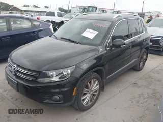 2012 Volkswagen Tiguan SE with VIN WVGAV7AX9CW611202, listed as a IAAI auction lot 41944210 with 118,002 mi miles and . Bid and sale history available at DreamBid. Image 2.