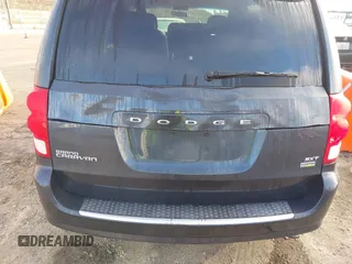 2014 Dodge Grand Caravan SXT with VIN 2C4RDGCG2ER267358, listed as a IAAI auction lot 41001692 with 186,763 mi miles and . Bid and sale history available at DreamBid. Image 6.