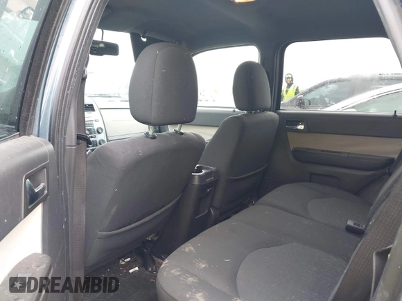 2010 Mercury Mariner with VIN 4M2CN8B72AKJ13326, listed as a IAAI auction lot 42284718 with 189,505 mi miles and . Bid and sale history available at DreamBid. Image 8.