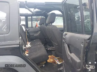2014 Jeep Wrangler Unlimited Sport with VIN 1C4BJWDGXEL294965, listed as a IAAI auction lot 41908152 with 243,546 mi miles and . Bid and sale history available at DreamBid. Image 8.