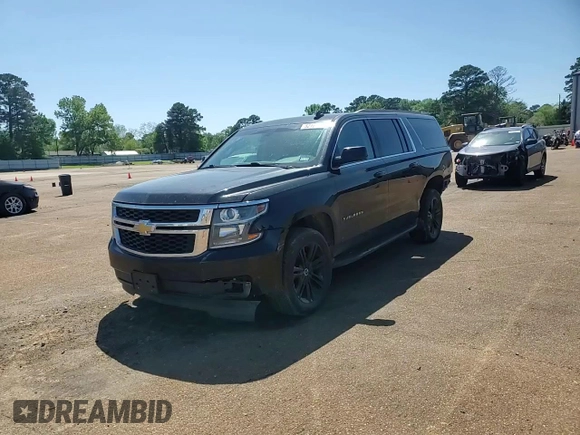 2019 Chevrolet Suburban LS with VIN 1GNSCGECXKR208615, listed as a Copart auction lot 52187105 with 174,105 mi miles and Salvage title. Bid and sale history available at DreamBid. Image 11.