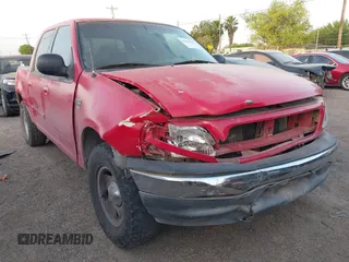 2001 Ford F-150 XLT with VIN 1FTRW07W61KF51667, listed as a IAAI auction lot 41846904 with 187,076 mi miles and . Bid and sale history available at DreamBid. Image 1.