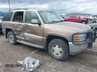 2003 GMC Yukon SLT z VIN 1GKEK13Z93R211332, wystawiony jako IAAI lot #41739150 z przebiegiem Nie podano mil oraz . Historia ofert i sprzedaży dostępna na DreamBid. Obrazek 1.