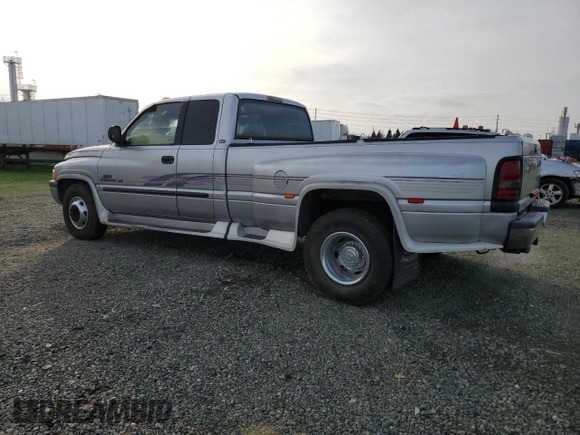2001 Dodge 3500 z VIN 1B7MC33W71J574245, wystawiony jako Copart lot #84877774 z przebiegiem 200 945 mil mil oraz Szkoda całkowita • Salvage title. Historia ofert i sprzedaży dostępna na DreamBid. Obrazek 2.
