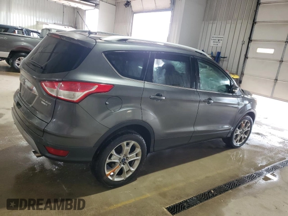2015 Ford Escape Titanium with VIN 1FMCU9J93FUC86300, listed as a Copart auction lot 60852895 with 156,296 mi miles and Salvage title. Bid and sale history available at DreamBid. Image 3.