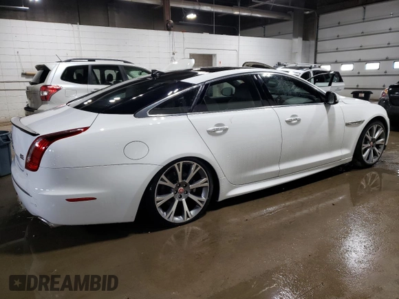 2015 Jaguar XJ with VIN SAJWJ1CD3F8V89374, listed as a Copart auction lot 49416114 with 94,636 mi miles and . Bid and sale history available at DreamBid. Image 3.