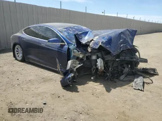 2017 Tesla Model S 100D с VIN 5YJSA1E28HF233322, выставлен на аукционе Copart как лот 62357925 с пробегом 110 383 миль миль и Списание • Salvage title. История ставок и продаж доступна на DreamBid. Изображение 4.