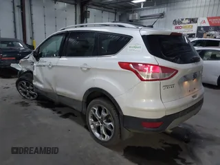 2016 Ford Escape Titanium with VIN 1FMCU9J94GUC79910, listed as a IAAI auction lot 41644467 with 43,261 mi miles. Bid and sale history available at carsss.com. Image 3.
