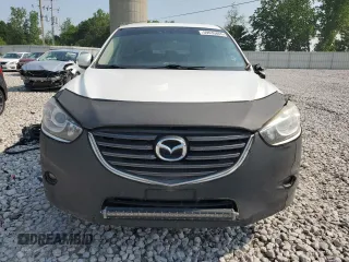 2016 Mazda CX-5 Grand Touring z VIN JM3KE4DY7G0864109, wystawiony jako Copart lot #59635865 z przebiegiem Nie podano mil oraz Czysty tytuł • Clean title. Historia ofert i sprzedaży dostępna na DreamBid. Obrazek 5.
