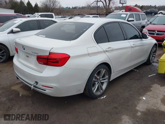 2018 BMW 3 Series 330i with VIN WBA8B9G53JNU57549, listed as a IAAI auction lot 41521049 with 63,557 mi miles and . Bid and sale history available at DreamBid. Image 4.