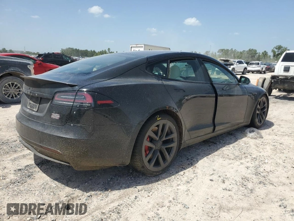 2023 Tesla Model S Plaid with VIN 5YJSA1E62PF511875, listed as a Copart auction lot 65583824 with Not provided miles and Salvage title. Bid and sale history available at DreamBid. Image 3.
