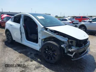 2021 Tesla Model Y Long Range with VIN 5YJYGAEE8MF187987, listed as a IAAI auction lot 41795626 with 56,007 mi miles. Bid and sale history available at carsss.com. Image 1.