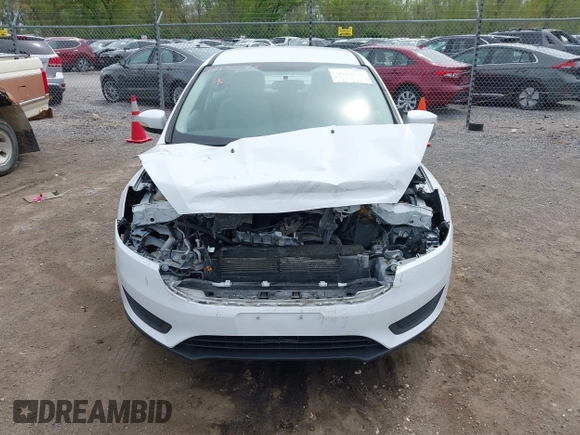 2016 Ford Focus SE with VIN 1FADP3F21GL403121, listed as a IAAI auction lot 42130743 with 103,592 mi miles and . Bid and sale history available at DreamBid. Image 12.