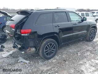 2019 Jeep Grand Cherokee Trailhawk with VIN 1C4RJFLTXKC696820, listed as a IAAI auction lot 41443851 with 50,848 mi miles. Bid and sale history available at carsss.com. Image 4.