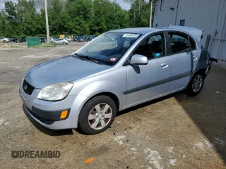 2009 Kia Rio LX with VIN KNADE223396548989, listed as a Copart auction lot 64964304 with 150,426 mi miles and Salvage Title. Bid and sale history available at carsss.com. Image 1.