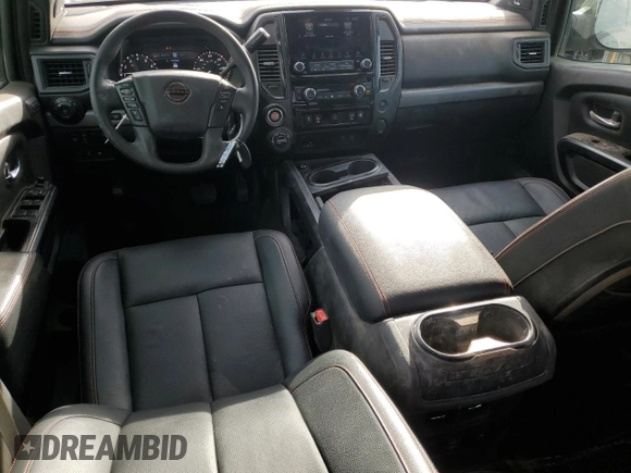 2024 Nissan Titan Pro-4X with VIN 1N6AA1ED3RN103011, listed as a Copart auction lot 87050954 with 8,829 mi miles and Salvage title. Bid and sale history available at DreamBid. Image 8.
