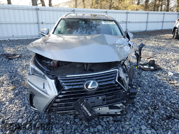 2021 Lexus NX with VIN JTJDARDZ2M2243568, listed as a Copart auction lot 49574715 with 33,065 mi miles and Salvage Title. Bid and sale history available at carsss.com. Image 5.