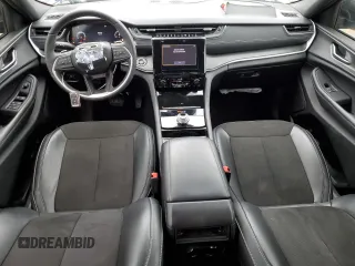 2023 Jeep Grand Cherokee Altitude with VIN 1C4RJGAG7PC573429, listed as a Copart auction lot 42961295 with 9,704 mi miles and Salvage title. Bid and sale history available at DreamBid. Image 8.