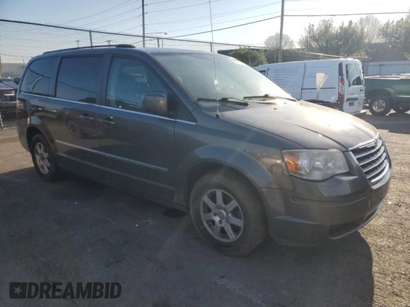 2010 Chrysler Town & Country Touring Plus with VIN 2A4RR8DX2AR358284, listed as a Copart auction lot 54311385 with 169,384 mi miles and Salvage Title. Bid and sale history available at DreamBid. Image 4.