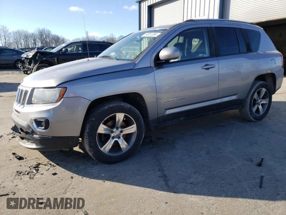 2016 Jeep Compass Latitude with VIN 1C4NJDEB2GD697923, listed as a Copart auction lot 84081394 with 167,240 mi miles and Salvage Title. Bid and sale history available at carsss.com. Image 1.