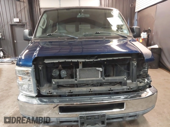 2011 Ford Econoline Cargo Commercial with VIN 1FTNE1EW0BDA89204, listed as a IAAI auction lot 41486132 with 34,930 mi miles and . Bid and sale history available at DreamBid. Image 13.