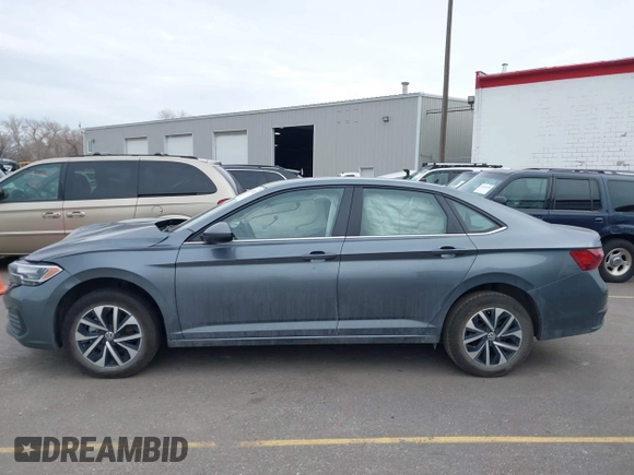 2022 Volkswagen Jetta with VIN 3VWNM7BU7NM028222, listed as a IAAI auction lot 41348223 with 50,623 mi miles and . Bid and sale history available at DreamBid. Image 14.