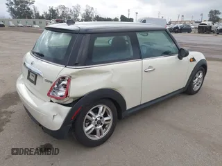 2011 MINI Hardtop with VIN WMWSU3C54BT183455, listed as a IAAI auction lot 42117672 with 130,530 mi miles and . Bid and sale history available at DreamBid. Image 4.