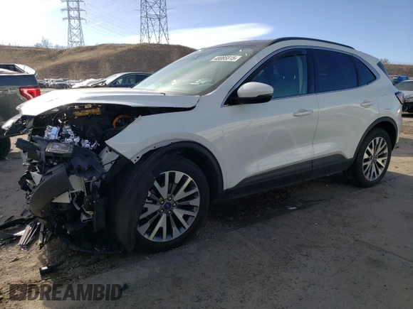 2020 Ford Escape Titanium Hybrid z VIN 1FMCU9DZXLUC07311, wystawiony jako Copart lot #48085815 z przebiegiem 50 472 mil mil oraz Szkoda całkowita • Salvage title. Historia ofert i sprzedaży dostępna na DreamBid. Obrazek 1.