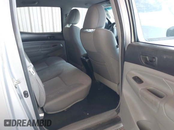 2014 Toyota Tacoma with VIN 3TMLU4EN3EM162738, listed as a IAAI auction lot 41871226 with 135,318 mi miles and . Bid and sale history available at DreamBid. Image 8.